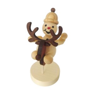 Schneemann Junior auf Schaukeltier